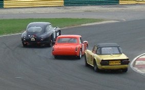 Steve Waddington sandwiched between an expensive Astom Martin & a TR6